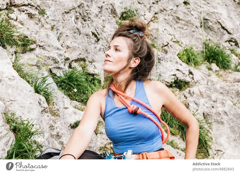 Beautiful Woman Looking Away On Cliff Confidence Rope Climber Standing Hiker Sport Activity Mountaineering Climbing Front View Hiking Adventure Exploration