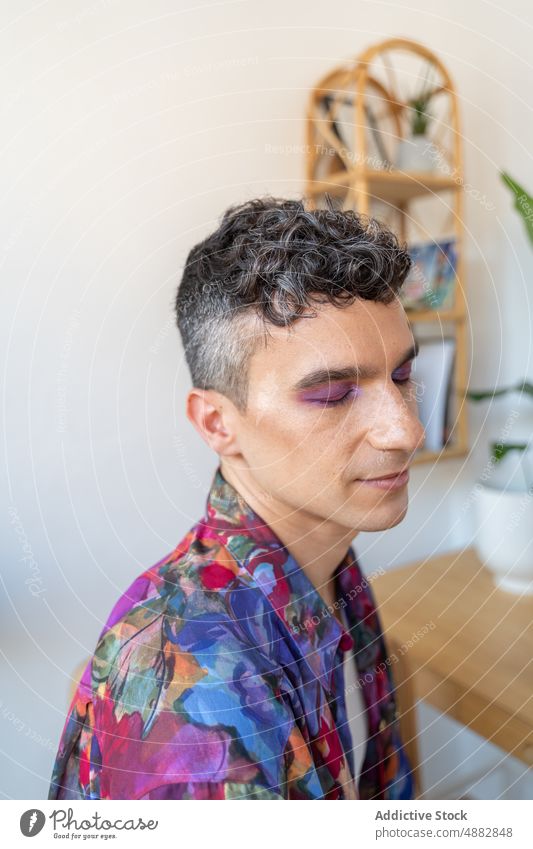 Closeup Of Transgender Man With Glitters On Eyeshadow Eye Shadow Purple Makeup Gay Eyes Closed Queer Fashion Individuality LGBTQI Pride Studio Shot Feminine