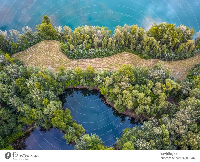 Aerial View of the Rohrhofer See at Bruehl. pond lake quarry rohrhofer see bruehl germany rhine river sunrise morning dawn panorama panoramic aerial view drone