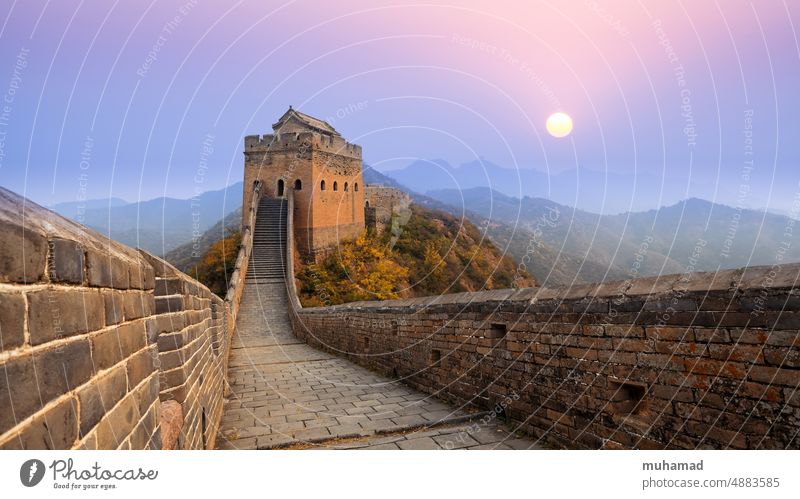 A beautiful sunset over the Great Wall Tower Architecture Bushes Copy Space top Long shot Wall (barrier) Colour photo Perturbed Dangerous Rebellious Historic