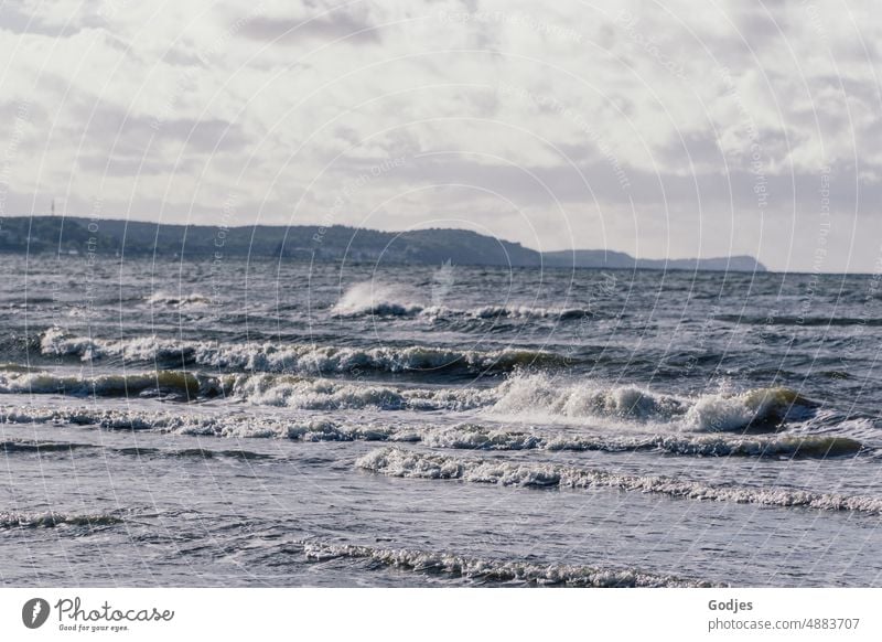 Waves on the Baltic Sea at the Swinoujscie beach with a view of Usedom Beach Water Ocean vacation Sand coast Far-off places Tourism Landscape Relaxation Horizon