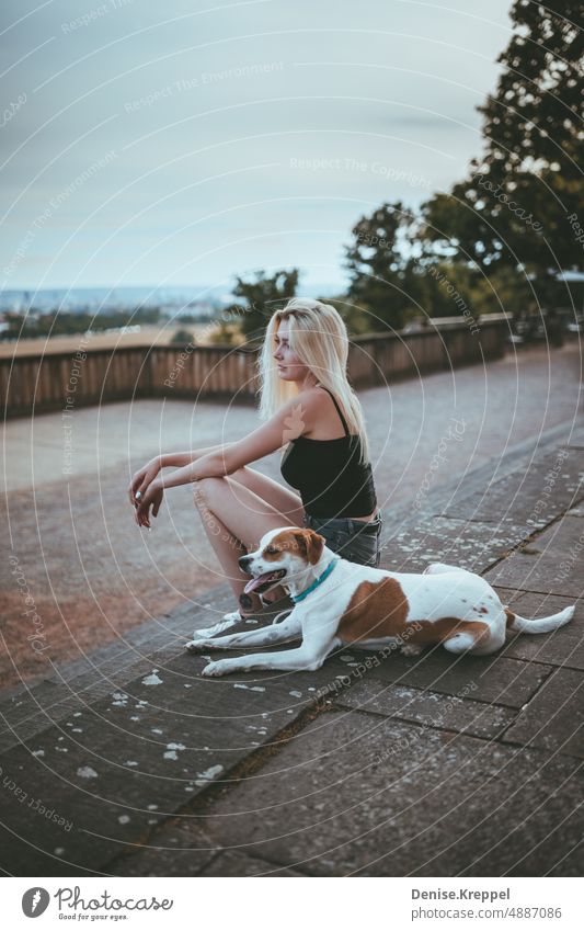 Woman relaxing with dog Face of a woman Woman's leg Girl power Idyll relaxed tranquillity relaxation Relaxation Summer free time holidays Joy Lifestyle pose
