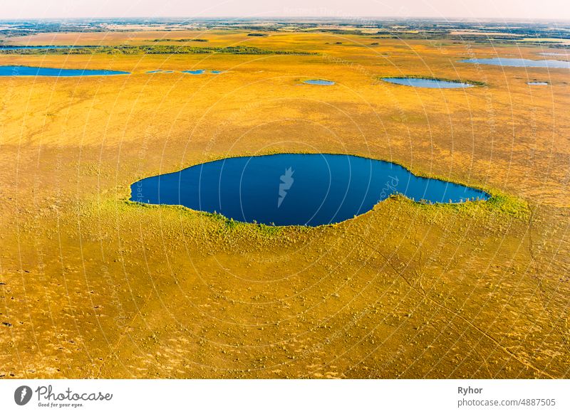 Miory District, Vitebsk Region, Belarus. The Yelnya Swamp. Upland And Transitional Bogs With Numerous Lakes. Elevated Aerial View Of Yelnya Nature Reserve Landscape. Famous Natural Landmark