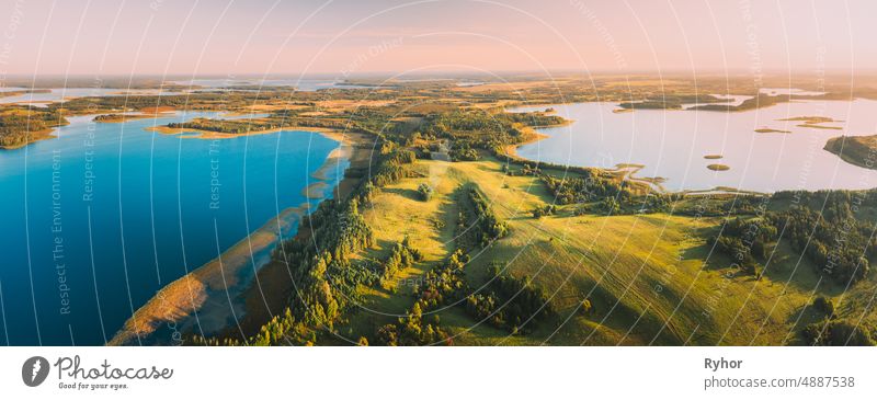 Braslaw Or Braslau, Vitebsk Voblast, Belarus. Aerial View Of Voyso Lake And Nyespish Lake In Sunny Autumn Morning. Top View Of Beautiful European Nature From High Attitude. Bird's Eye View. Panorama. Famous Lakes. Natural Landmarks