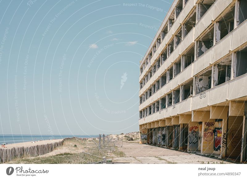 Vacant hotel ruin directly on the sandy beach Architecture Building Hotel Tourism Crisis Vacancy Ruin Trashy Apocalyptic sentiment Decline Change