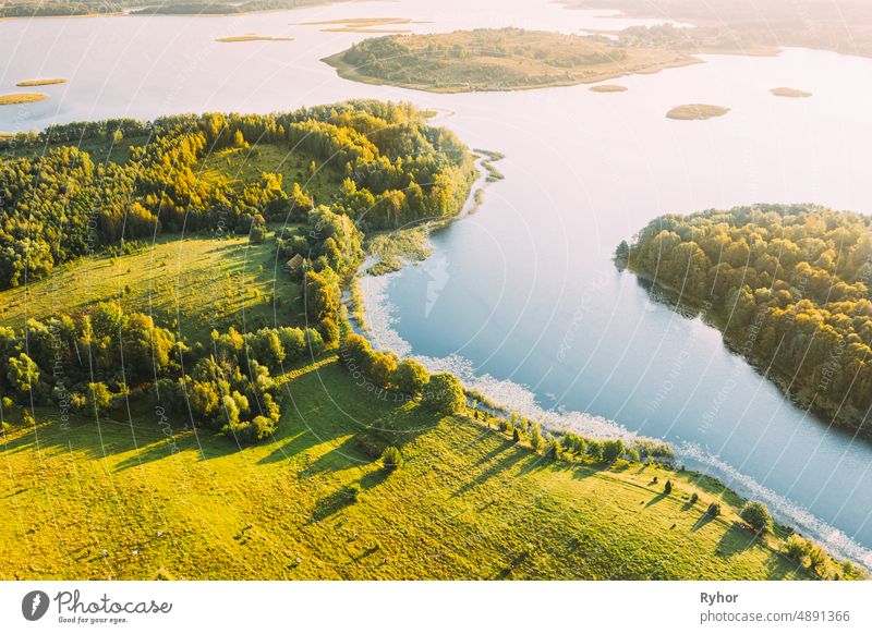 Braslaw Or Braslau, Vitebsk Voblast, Belarus. Aerial View Of Nedrava Lake, Green Forest And Meadow Landscape In Sunny Autumn Morning. Top View Of Beautiful European Nature From High Attitude. Bird's Eye View. Panorama. Famous Lakes. Natural Landmarks