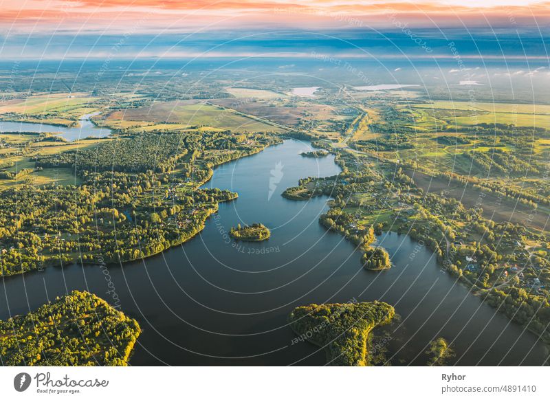 Lyepyel, Lepel Lake, Beloozerny District, Vitebsk Region. Aerial View Of Lyepyel Cityscape Skyline In Autumn Morning. Morning Fog Above Lepel Lake. Top View Of European Nature From High Attitude In Autumn. Bird's Eye View