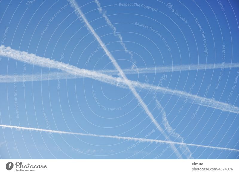 several contrails in blue sky / vacation / air traffic / wanderlust Vapor trail Homomutatus aviator Flying Holiday planes Summer chemtrails Air miles flight Sky