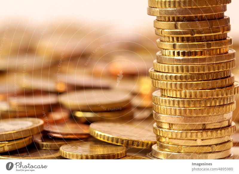 Stack of coins. Euro coins stacked. A pile of coins background. Receipts and profits. Account accounting Bench banking business Loose change Exchange Close-up