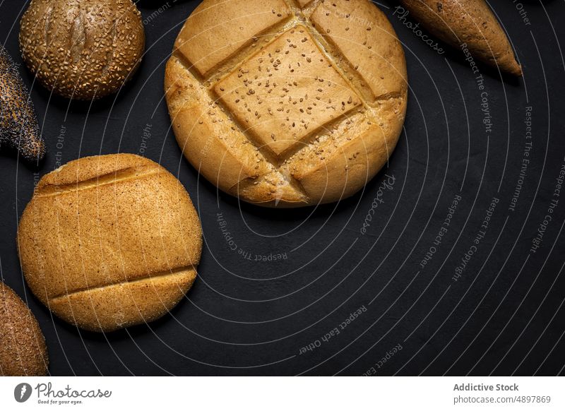 Assorted freshly baked bread loaves loaf baguette mix wholegrain bakery assorted food natural sesame various many abundance culinary organic different