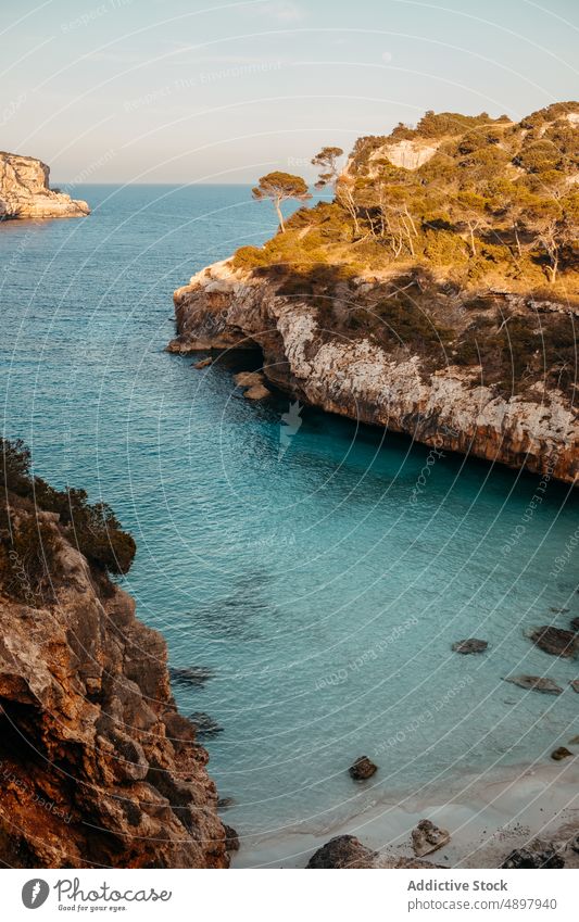 Picturesque seascape with massive rocky cliff in Mallorca landscape scenery nature formation seashore spectacular breathtaking ocean scenic mountain dwell