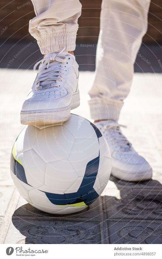 Anonymous Man With Foot On Football Young Shoe Standing Footpath Soccer Player White Leg Shadow Lifestyle Ball Fashion Leisure Sport Fashionable Attractive City