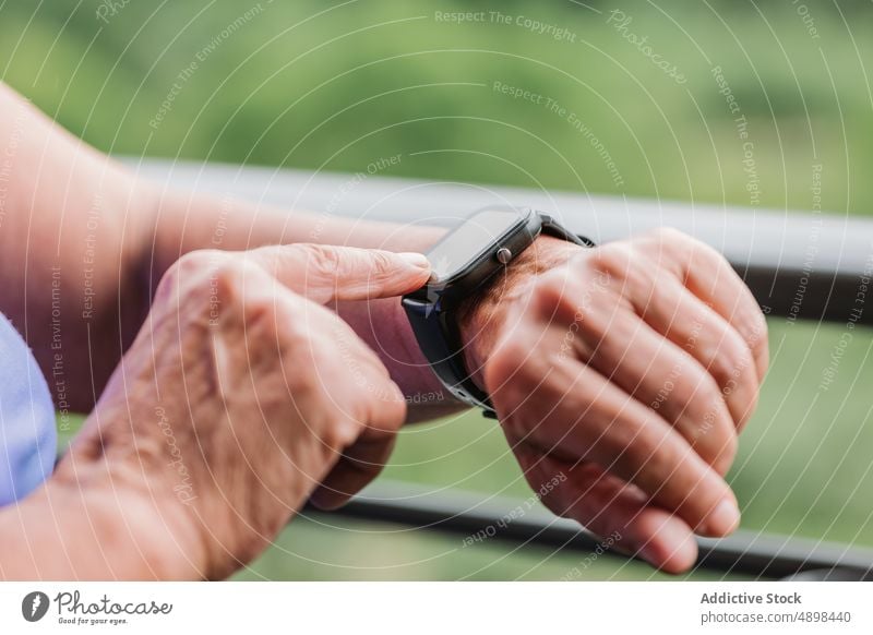 Hands Setting Up The Fitness Smart Watch Before Workout Senior Woman Screen Touching Cropped Closeup Active Exercise Healthy Lifestyle Using Wearable Computer