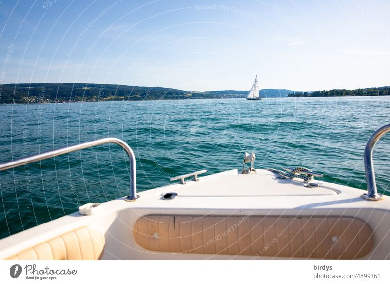 View from the boat over Lake Constance. View from the bow of a boat on a sailboat Sailboat Water Navigation rail Boating Summer vacation Vacation & Travel