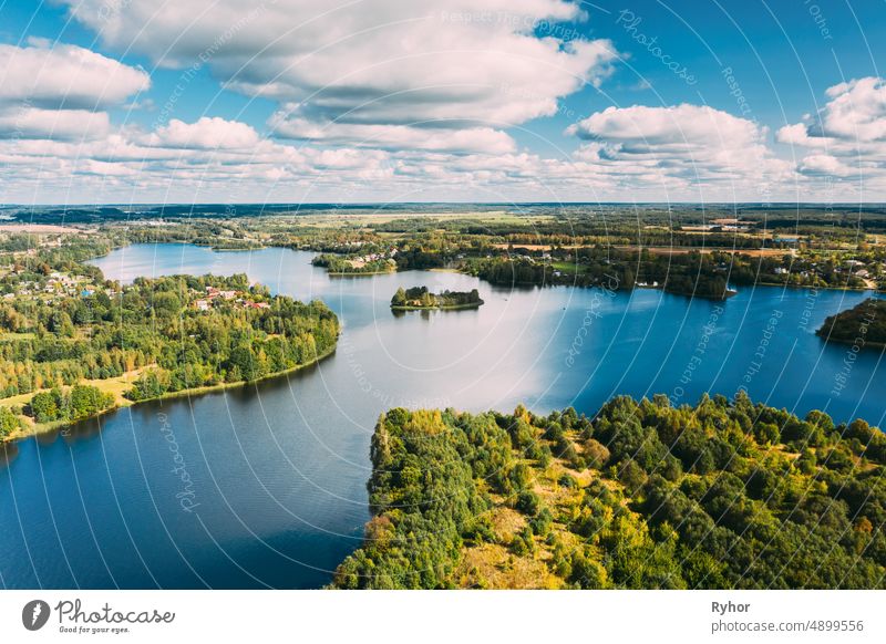 Lyepyel District, Vitebsk Region, Belarus. Aerial View Of Lyepyel Cityscape Skyline In Summer Day. Sunny Sky Above Lepel Lake. Top View Of European Nature From High Attitude In Summer. Bird's Eye View