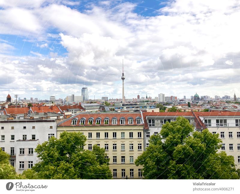 View over the roofs of Berlin, television tower central in the background, lively sky Downtown Berlin Berlin TV Tower Television tower Bird's-eye view Sky