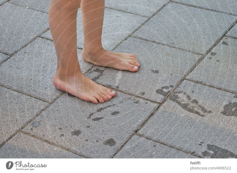 Wet children's feet leave traces Concrete Imprint Walking Water splashing Summer Footprint Going Feet Barefoot Tracks Exterior shot Relaxation Child Glittering