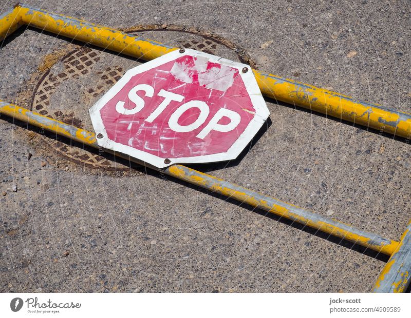 STOP The Police Signs and labeling Street fallen Road sign Street art Lettering Stop Characters Traffic infrastructure Gully rail Ravages of time Crete Greece