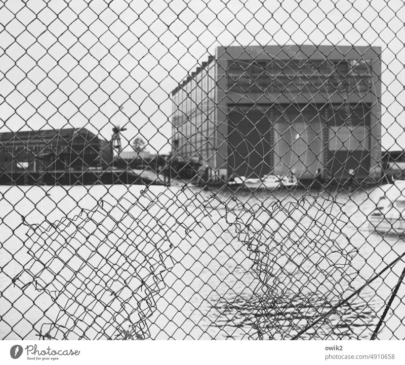 Shipyard crisis Wire netting fence Barrier Gloomy Exterior shot Black & white photo cordoned off forsake sb./sth. Industrial Photography dockyard Shipbuilding