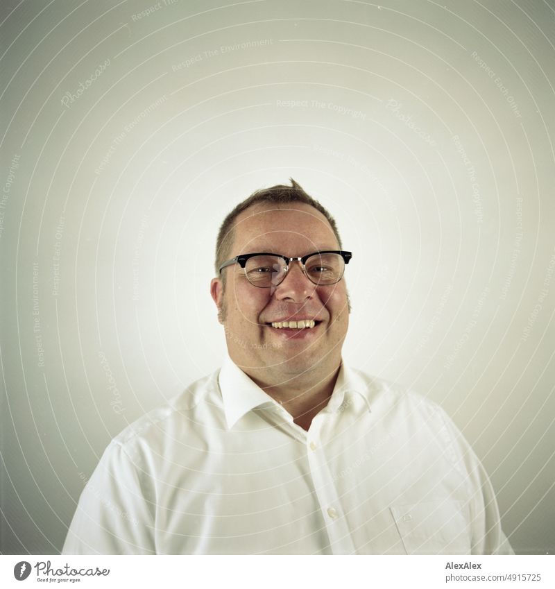 Analog portrait of man in shirt with glasses smiling at camera. Profession Lifestyle Economy Office Work and employment Good pretty Upper body 35-50 years