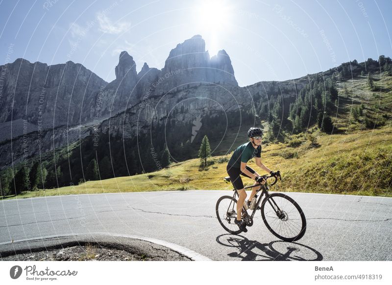 Road cyclist climbing the Italian Dolomites Alpine Alps Alto Adige Athlete Autumn Beautiful Blue Blue Sky Climbing Cycling Cyclist Enjoyment Exercising Fitness
