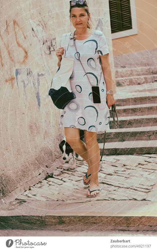 Woman in white summer dress walking down stairs with her dog Dress White Stairs Dog vacation take a walk travel tourist kind Flip-flops Vacation & Travel Summer