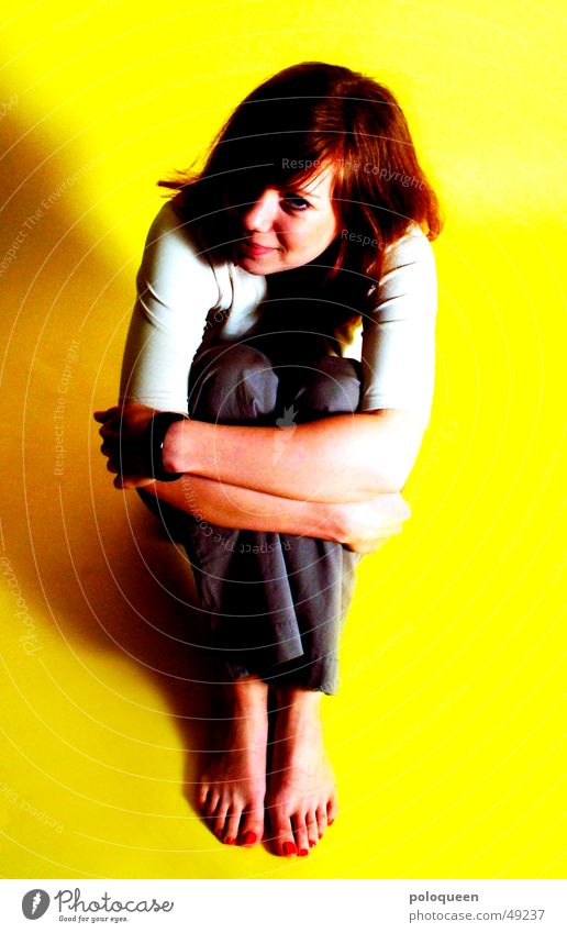 no rest for the wicked Portrait photograph Woman Yellow Red Looking Sit