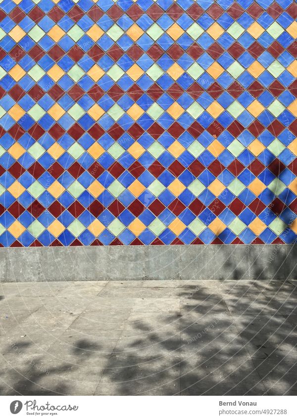 Colorful tile pattern on a sunny wall Wall (building) Wall (barrier) Architecture Building Facade Deserted Exterior shot Manmade structures Day Colour photo
