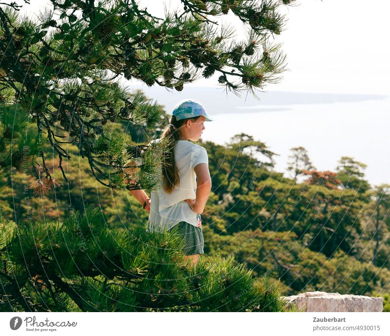 Girl walking under a pine tree, looking at the sea Hiking Cap Jawbone baseball cap Green Nature Ocean vacation Summer Tree Forest Relaxation