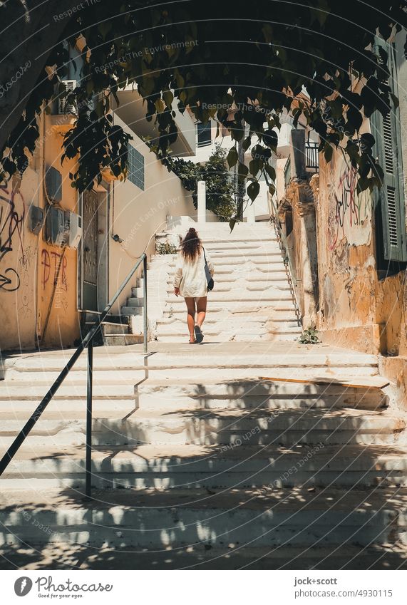 Greek stairs and a young woman Young woman Stairs Summer Greece Crete Agios Nikolaos Vacation & Travel Banister Sunlight Shadow Branches and twigs