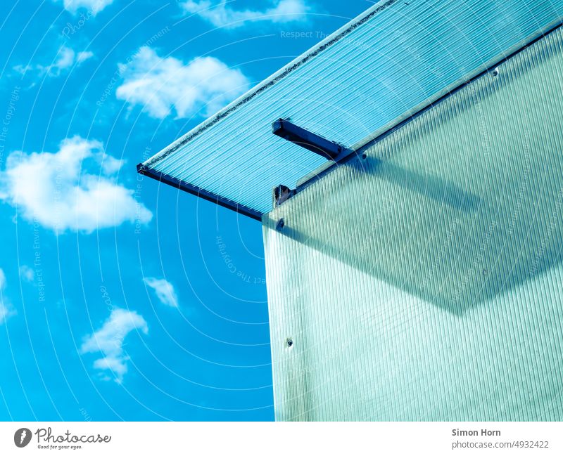 Roof overhang under blue sky Structures and shapes Clouds Corner Sky Geometry Canopy roof overhang Blue Human hand Abstract Refraction Construction Line