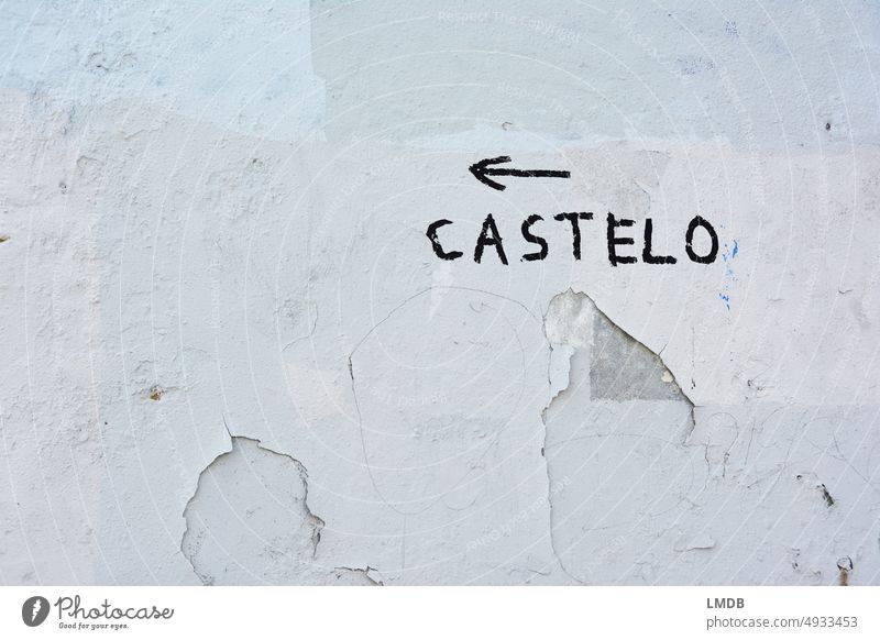 <-- CASTELO Lock castle Castle ruin castelo de sao jorge Lisbon lisbon portugal lisboa Road marking path marking Arrow ARROW DIRECTOR Arrow left ARROW SYM White