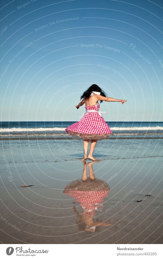 Dancing woman in dirndl on the beach Lifestyle Elegant Style Joy Contentment Summer Sun Waves Dance Human being Woman Adults Dancer Beach Ocean Fashion Dress