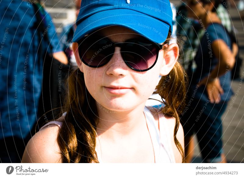 The right casual cool sun protection in the summer. Sunglasses and cap. Put on sunglasses portrait Joy Protection Colour photo Human being To put on