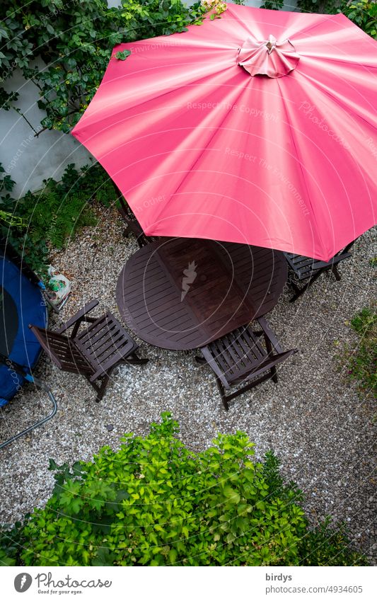 Bird's eye view sitting area with red parasol in garden Lounges Garden Sunshade chairs Table plants at home Bird's-eye view Red Green Gray coziness Summer