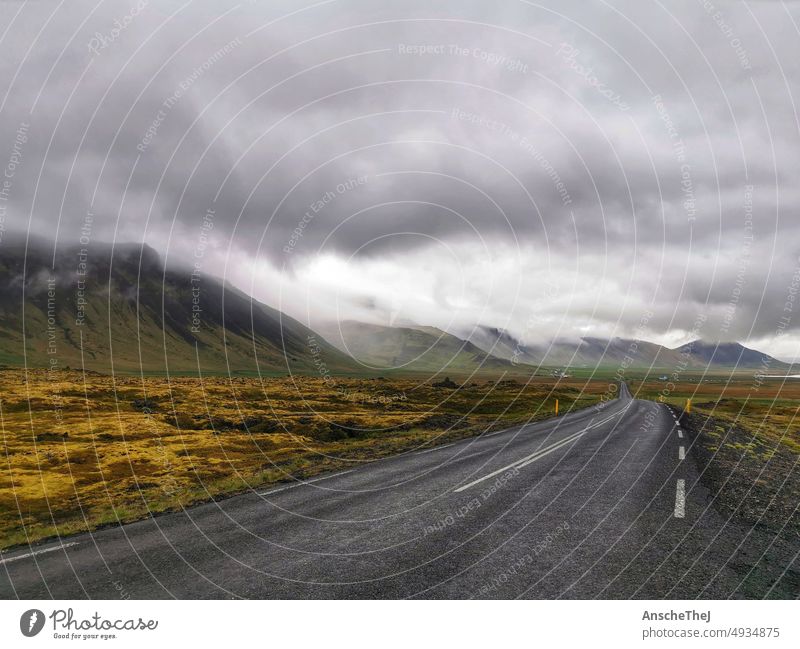 Iceland Roudtrip Clouds Street Sky mountains vacation Moody Nature