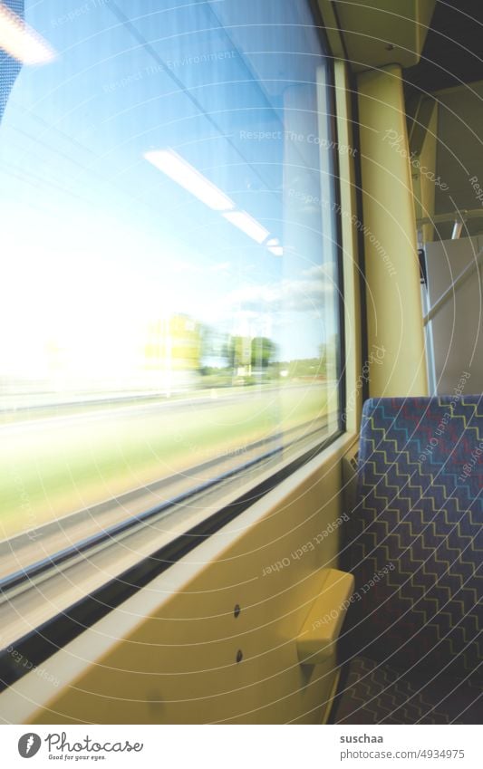 ride with the s-bahn Commuter trains Train travel 9 Euro ticket Expensive Passenger transport Window Window seat view outside seat cushions back Speed Transport