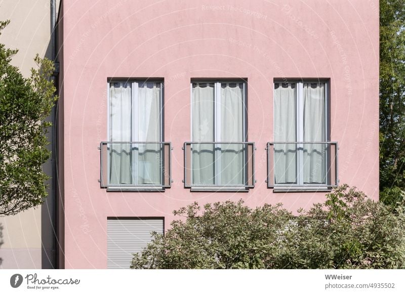 All just facade: pink apartment house and windows with closed curtains in green environment Window Apartment Building Facade dwell Pink pastel shades kind