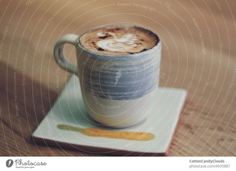 Cup of cappuccino in a coffee bar cup cafe espresso beverage coffee shop coffee cup breakfast hot mug background fresh wooden white brown isolated caffeine food