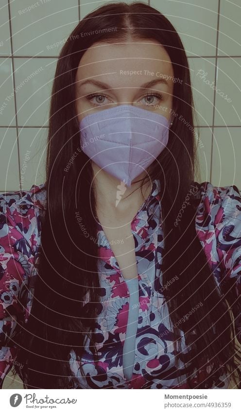 dark haired woman with mask Selfie corona Mask purple Violet Colour tiles Bathroom Pattern Mask obligation pandemic Protection prevention Corona virus