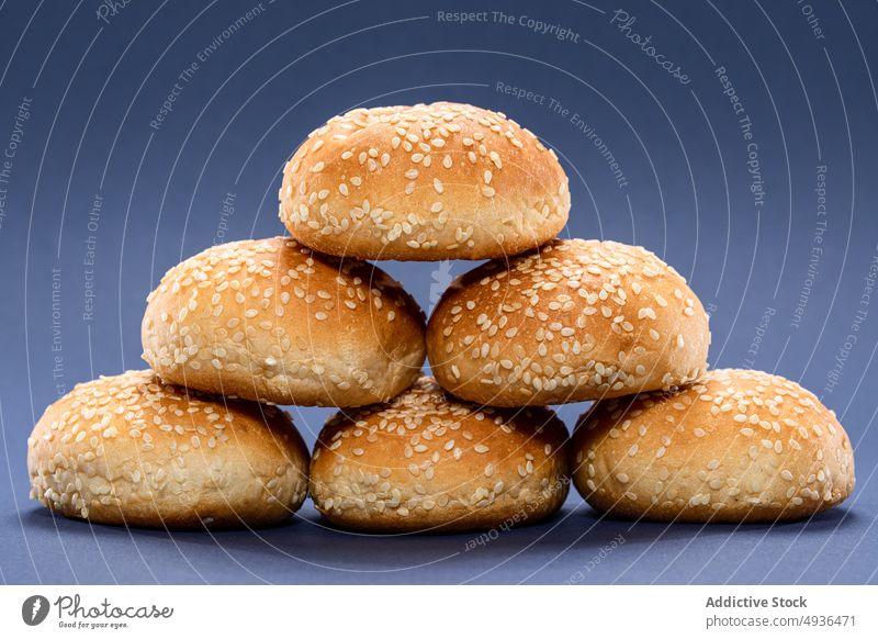 Stack of fresh burger buns stack whole sesame fast food pastry bunch baked bright gastronomy pile heap gourmet tasty yummy delicious appetizing vivid product