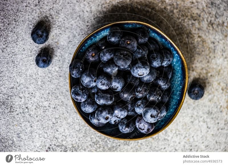 Fresh blueberries in the bowl assortment background berry blueberry close up concrete food fresh fruit healthy organic ripe seasonal summer table variety dark