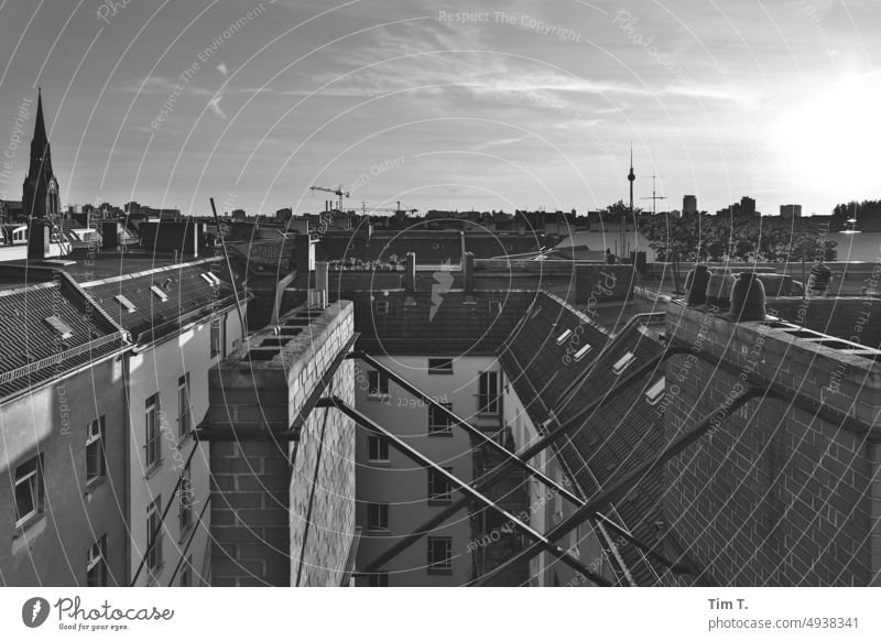 View over the roofs of Friedrichshain with television tower bnw Television tower b/w Church Sunlight Skyline Day Black & white photo Exterior shot Deserted