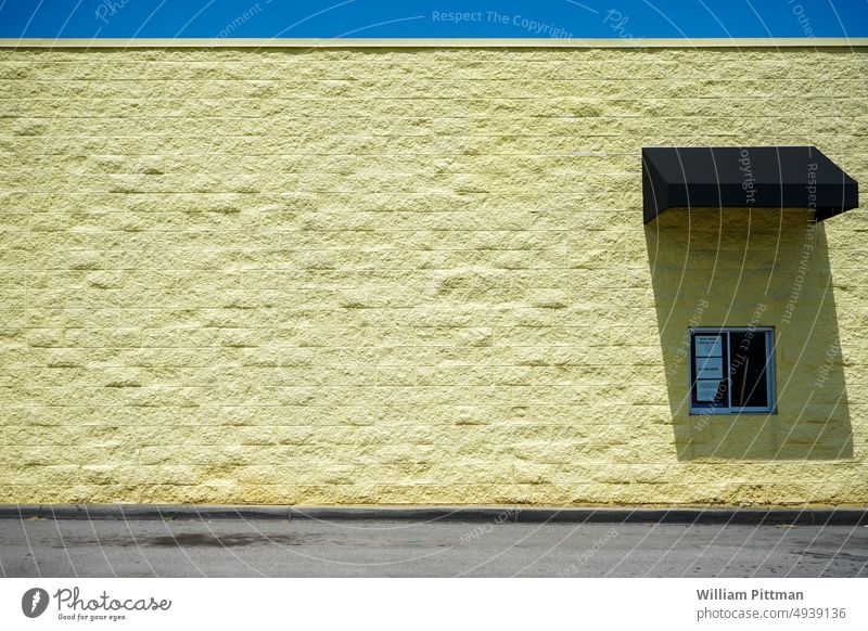 Yellow Drive-Thru yellow background Wall (building) Background picture Abstract Colour Colour photo Structures and shapes Deserted Facade Exterior shot