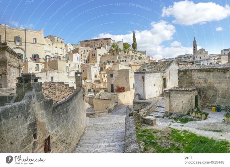 Matera in Southern Italy city basilicata italy southern italy old historic house building culture tradition summer sunny sassi di matera old town alley alleyway