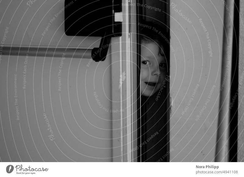 Play hide and seek Hide Boy (child) Child Joy Looking Face Looking into the camera Infancy Human being Toddler 1 - 3 years portrait Black & white photo
