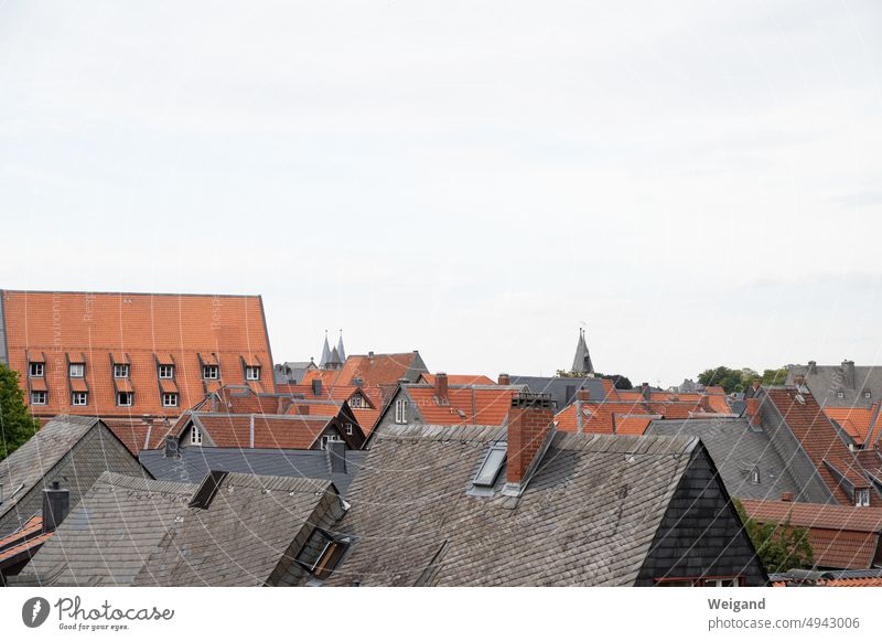 The roofs of Goslar Town downtown shingles Gray Red Sky Germany Harz city centre colonization Development Apartments Rent
