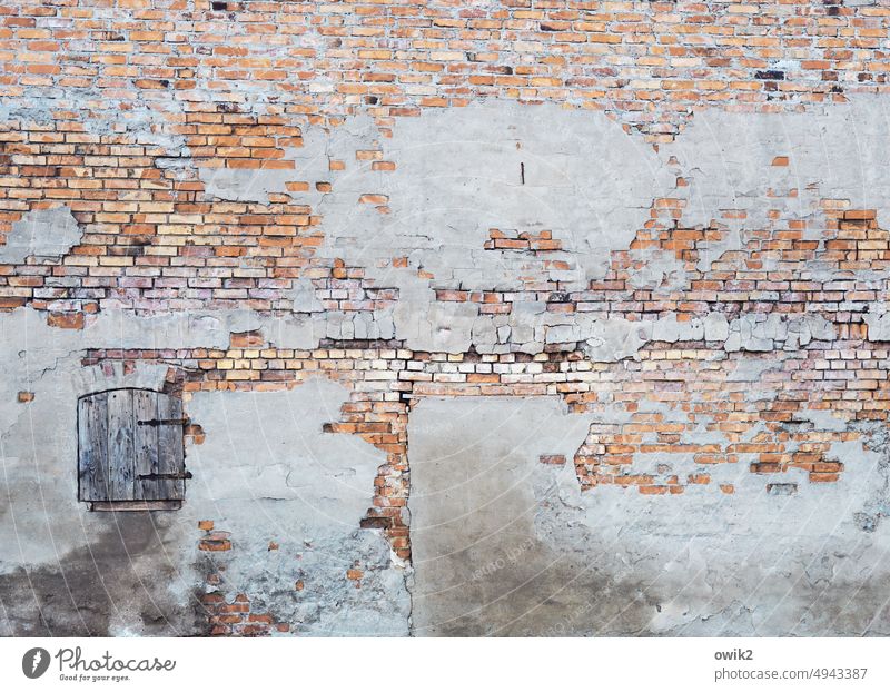 Trimmed to old Brick wall Facade Brick facade stone on stone Abstract Building Abrasion Derelict Rendered facade Ravages of time Thrifty Detail