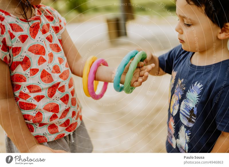 Brother and sister playing with colorful toys Child childhood two people Brothers and sisters Together Human being Infancy Joy Lifestyle Happy Happiness
