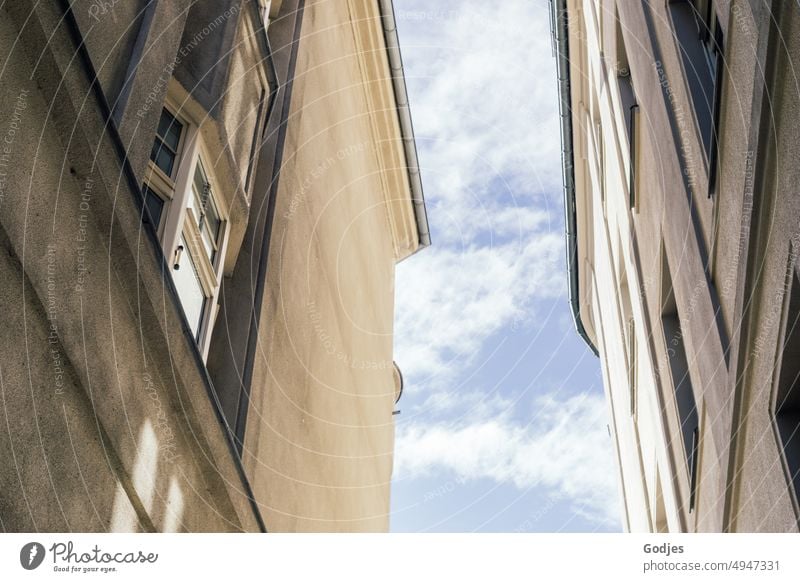 View from a dark street of houses to the blue sky Facade Alley Sky Blue sky Town House (Residential Structure) Architecture Deserted Window Building